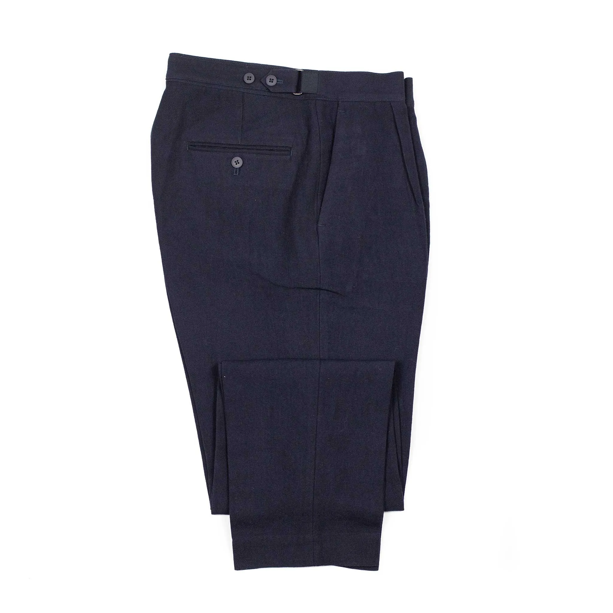 Side tab pleated trousers in dark navy soft wool and linen oxford